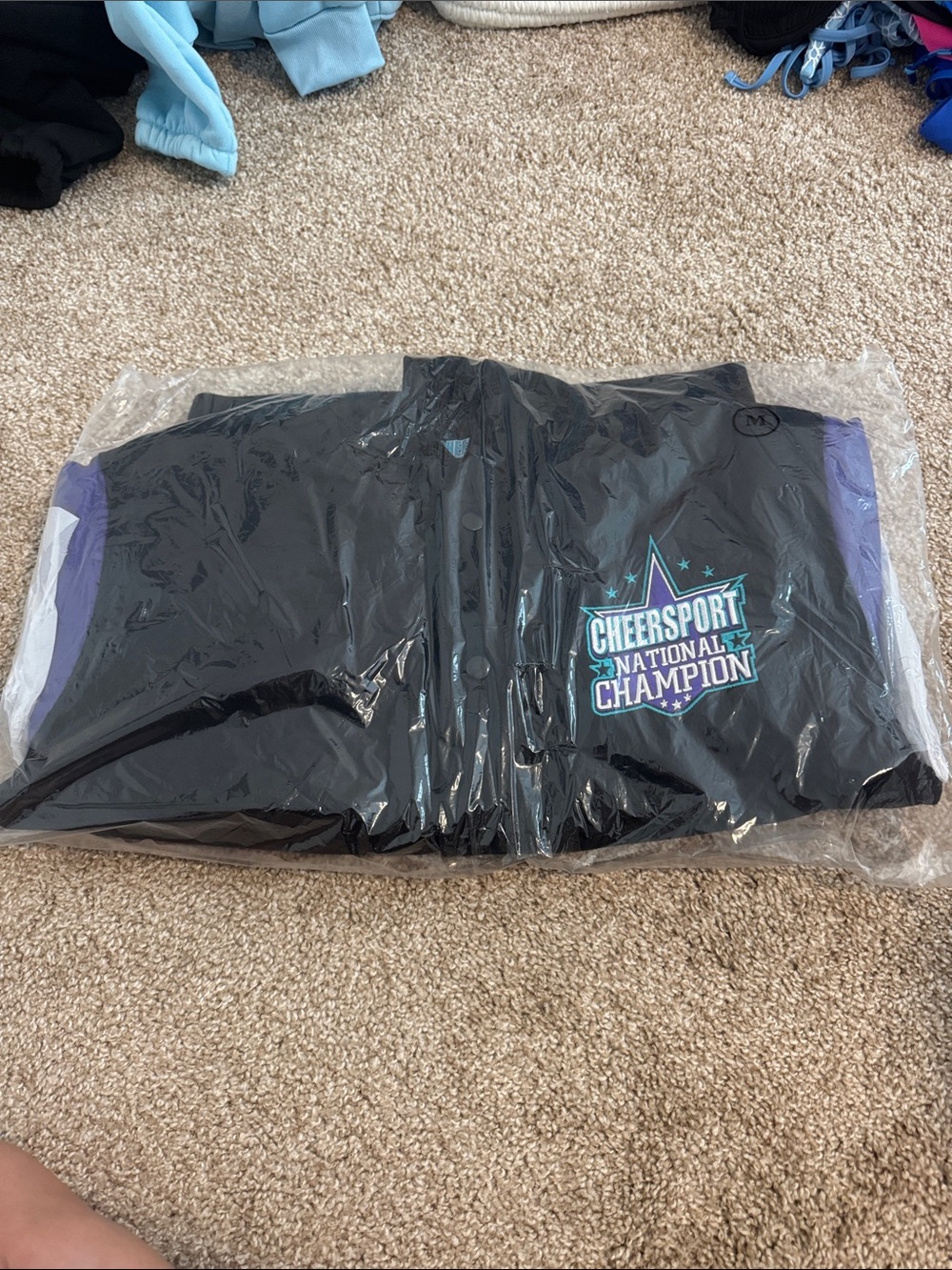 2026 CHEERSPORT National Champion Jacket - Black with Teal & Purple Logo